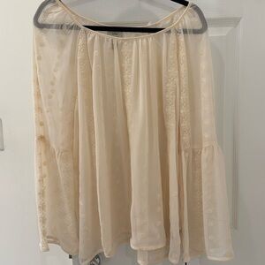 Beautiful.  Brand new.  Feminine. Wide sleeves